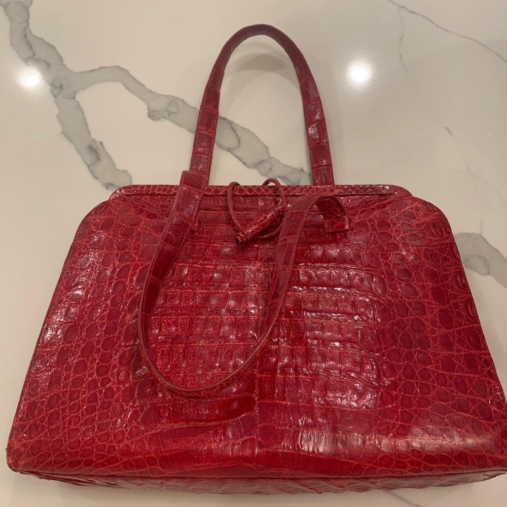 Nancy Gonzalez red crocodile bag